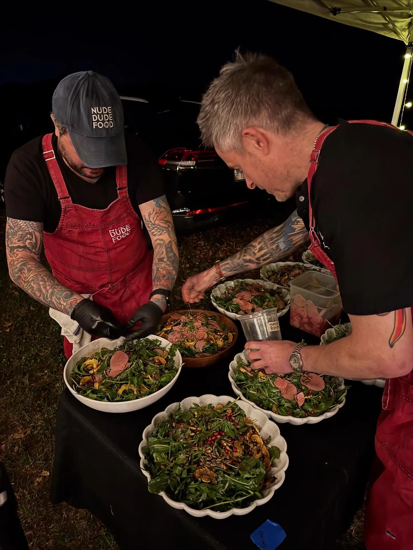 Guests cooking and sharing food together in an NDF class
