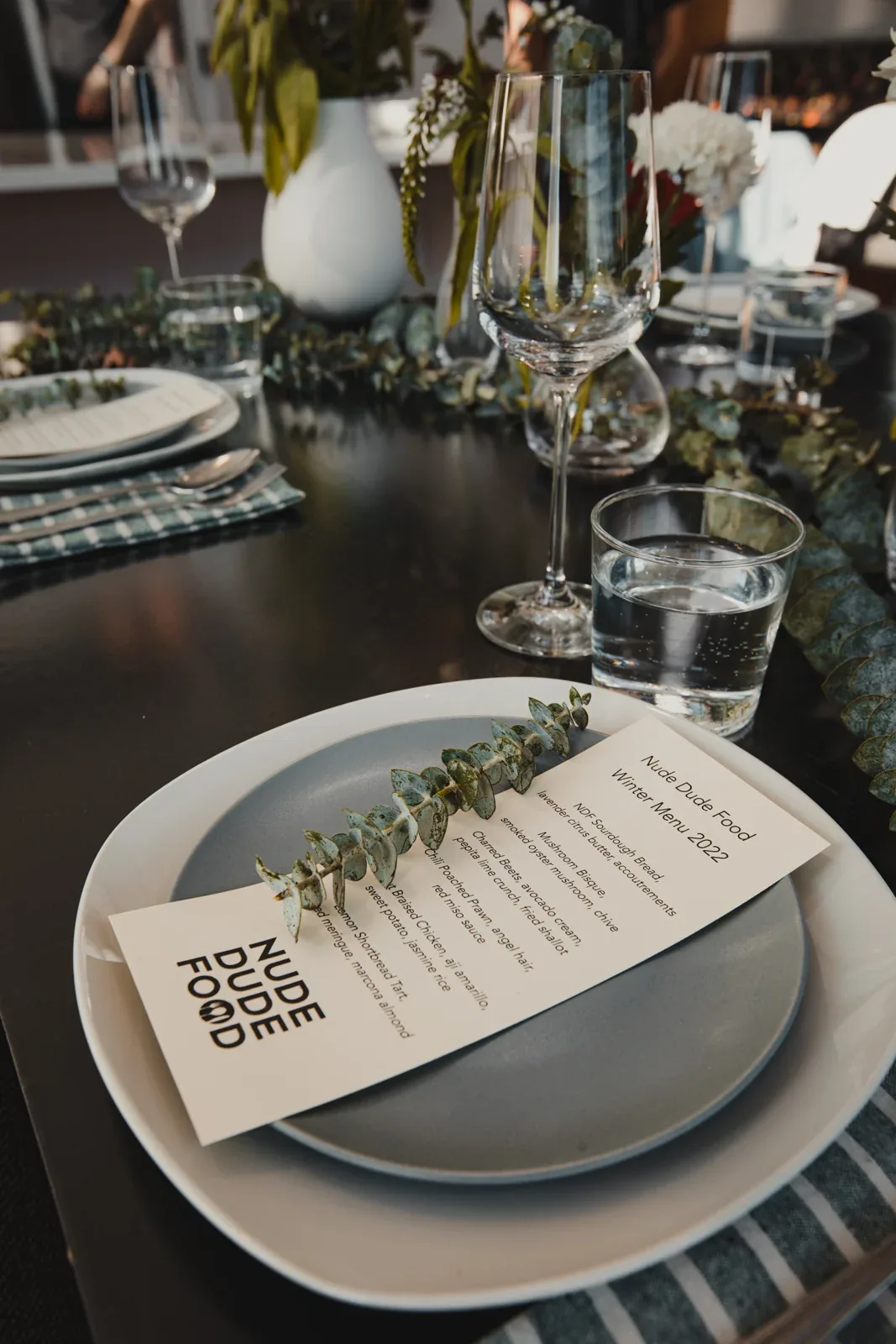 A carefully set place setting for an NDF executive dining table
